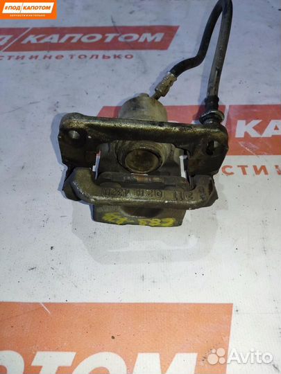 Суппорт тормозной задний левый Suzuki Grand Vitara