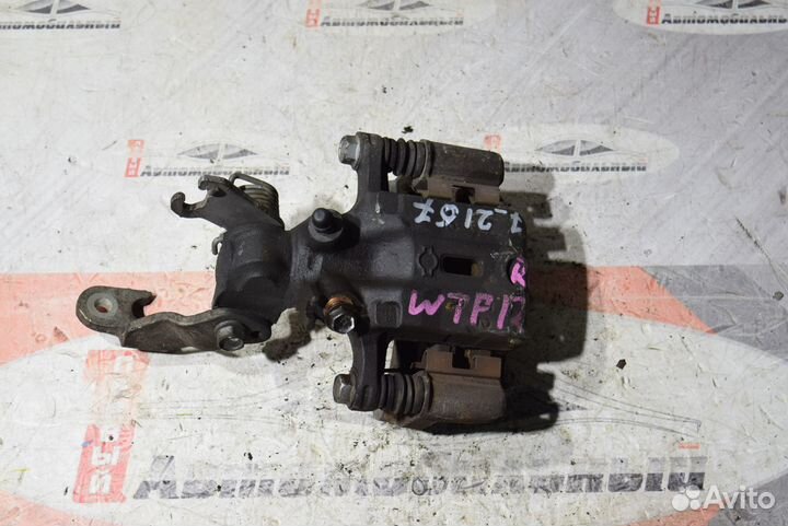 Суппорт зад право c Nissan Primera WTP12 QR20DE