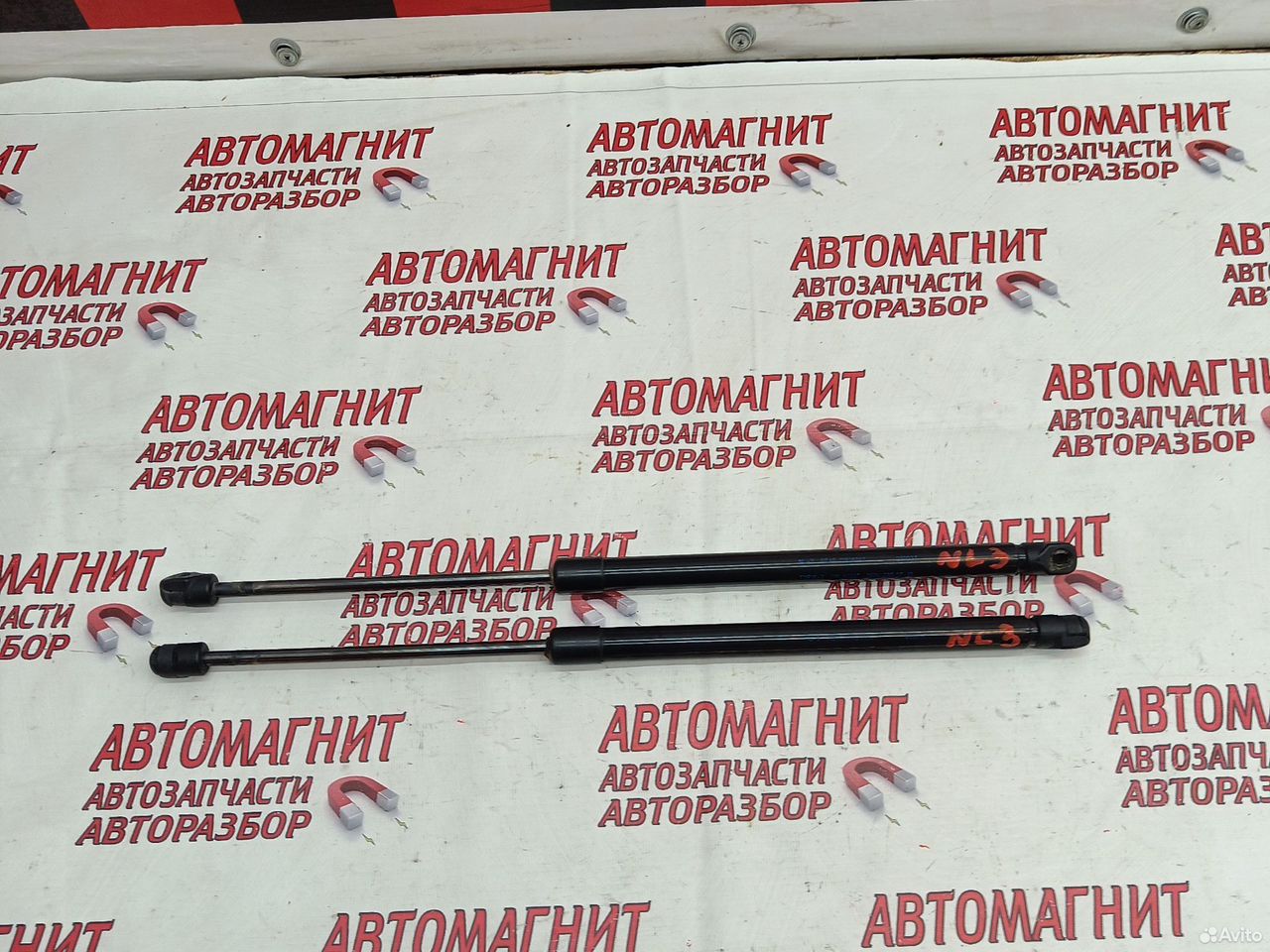 Амортизатор крышки багажника Geely Atlas