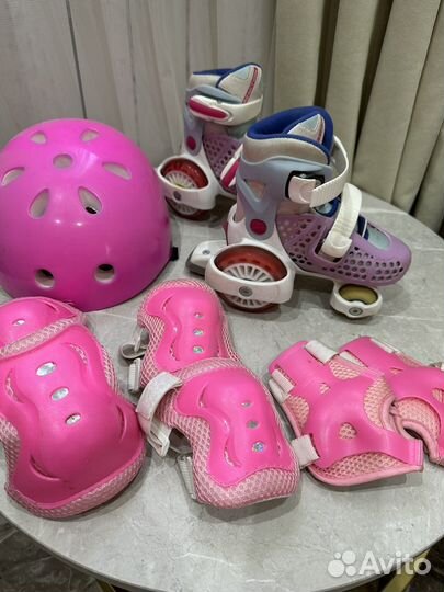 Роликовые коньки