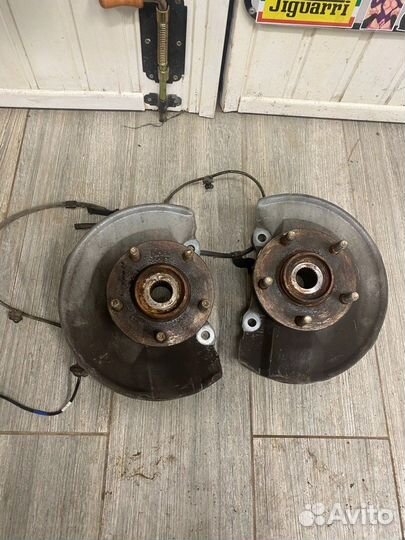 Кулаки поворотные в сборе Mitsubishi Lancer X