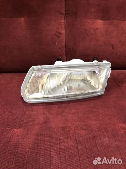 Фара левая на мицубиси каризма