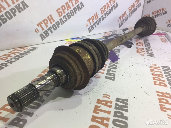 Мазда сх-7 Полуось задняя левая Лев