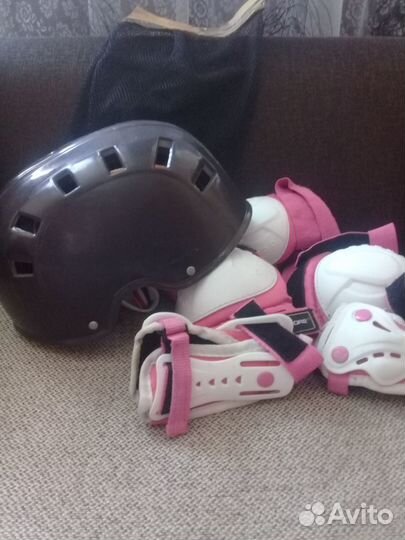 Роликовые коньки