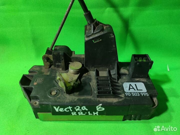 Замок двери задний левый Opel Vectra