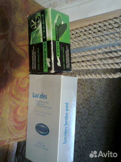 Комплект новых тормозных колодок Шевроле Тахо