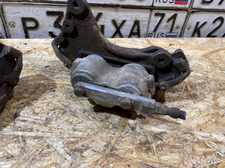 Суппорт передний Chevrolet Niva