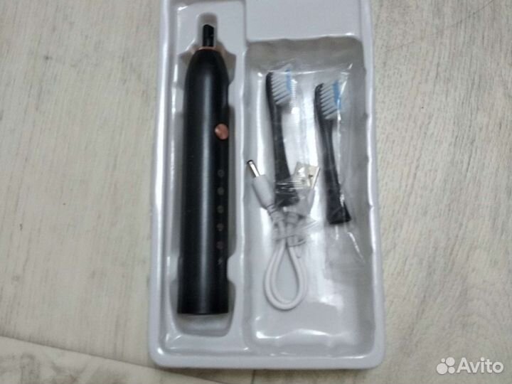 Электрическая ультразвуковая зубная щетка