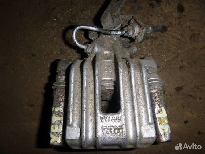 Суппорт задний левый skoda yeti 2010