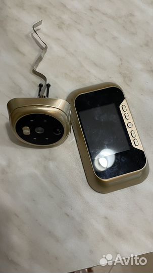 Глазок видеонаблюдения