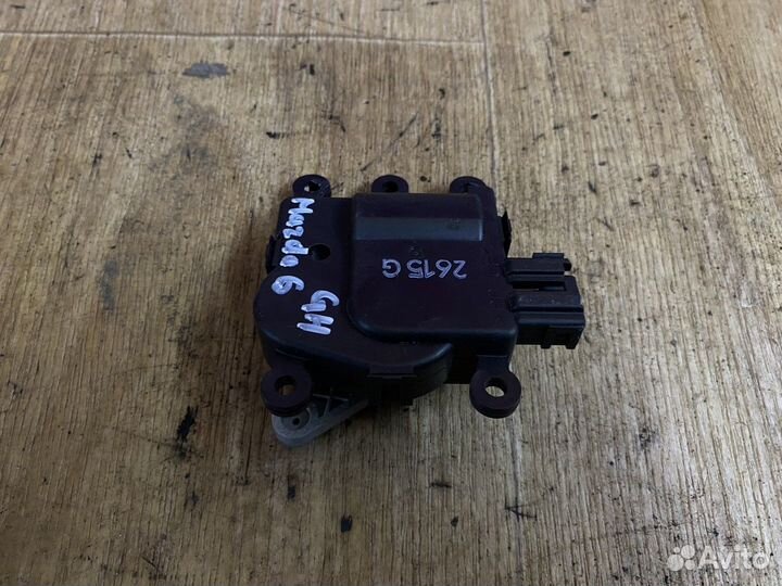 Моторчик привода заслонок отопителя Мазда 6 gн