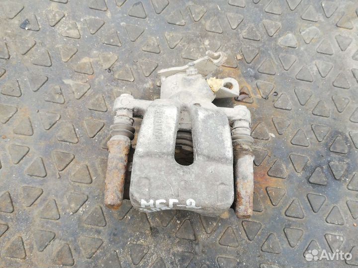 Суппорт тормозной задний Рено Меган 2