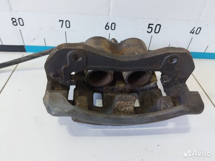 Суппорт тормозной передний левый Kyron 2005-2015