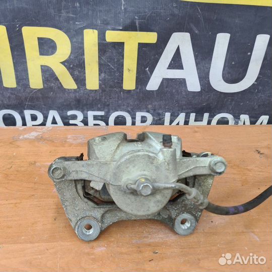 Суппорт тормозной передний правый Kia Sportage 5