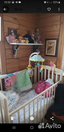 Детская кроватка с маятником