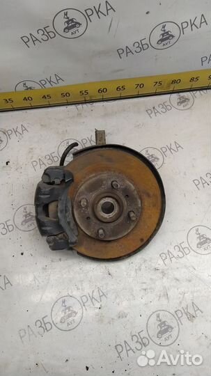 Кулак поворотный Mitsubishi Lancer