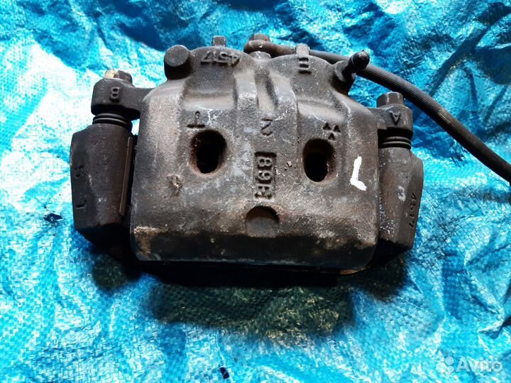 Суппорт тормозной передний левый. Контракт