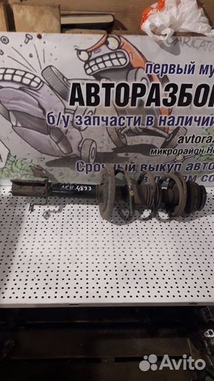 Стойка амортизатора переднего левого Renault Logan