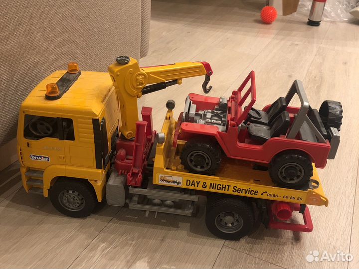 Детские игрушки эвакуатор bruder