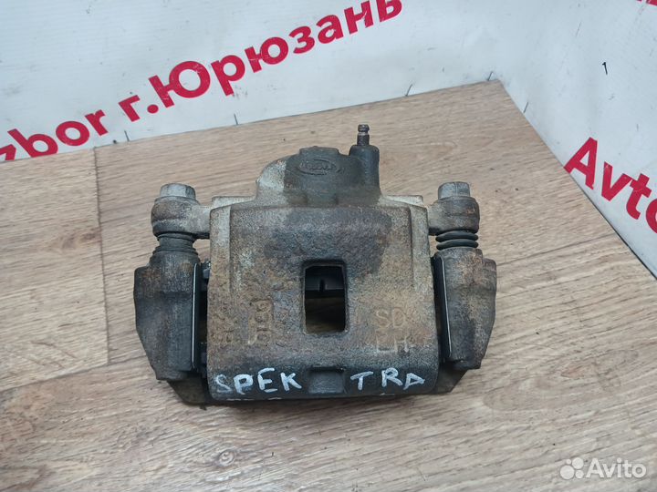 Передний левый суппорт Kia Spectra