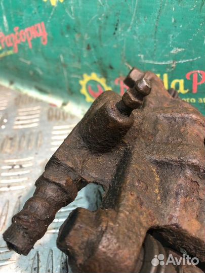 Суппорт задний левый Mitsubishi Lancer 9 седан