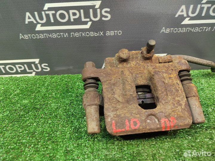 Суппорт задний правый Mitsubishi Lancer X седан