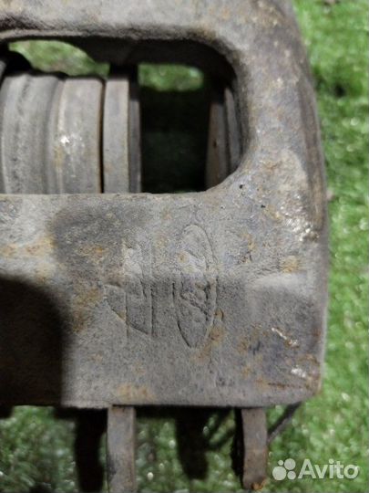 Суппорт тормозной передний левый Ford Focus 1.6