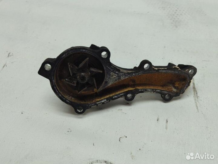 Помпа Nissan Bluebird EU14 QG18225669 1998