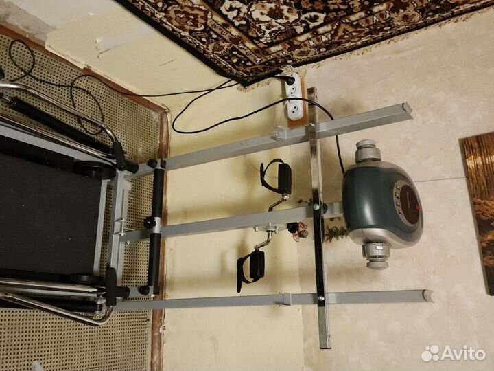 Гребной тренажер