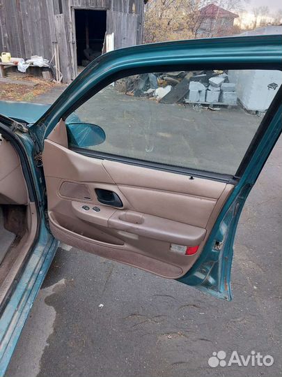 Обшивка двери Mercuri Sable 2 Ford Taurus 2