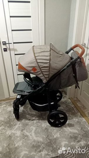 Прогулочная всесезонная коляска camarelo elix