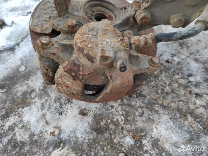 Тормозной суппорт передний левый Fiat Albea