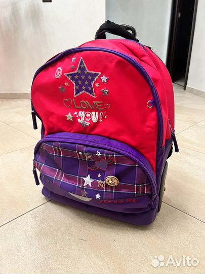 Рюкзак для девочки на колесиках