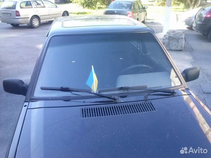 Лобовое стекло на Ford Escort