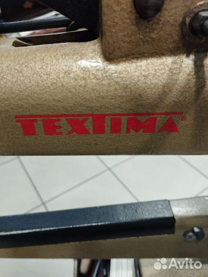 Рукавная швейная машинка