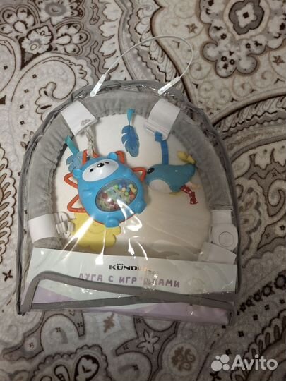 Дуга с игрушками