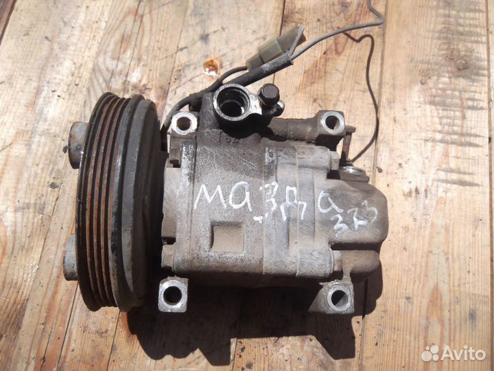 Компрессор кондиционера Mazda 323
