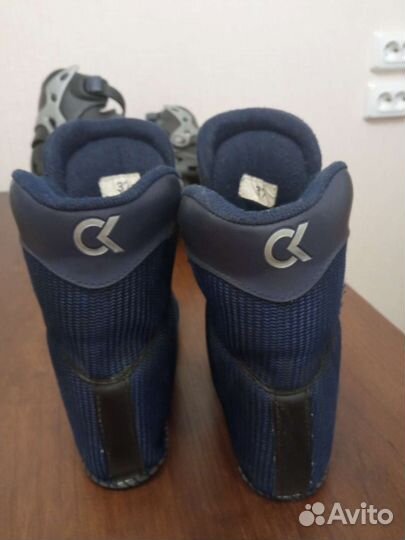 Роликовые коньки