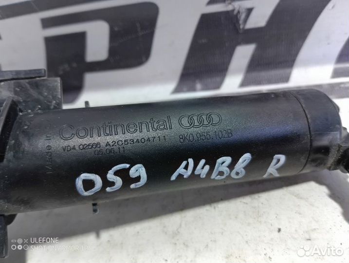 Форсунка омывателя фар передняя правая Audi A4