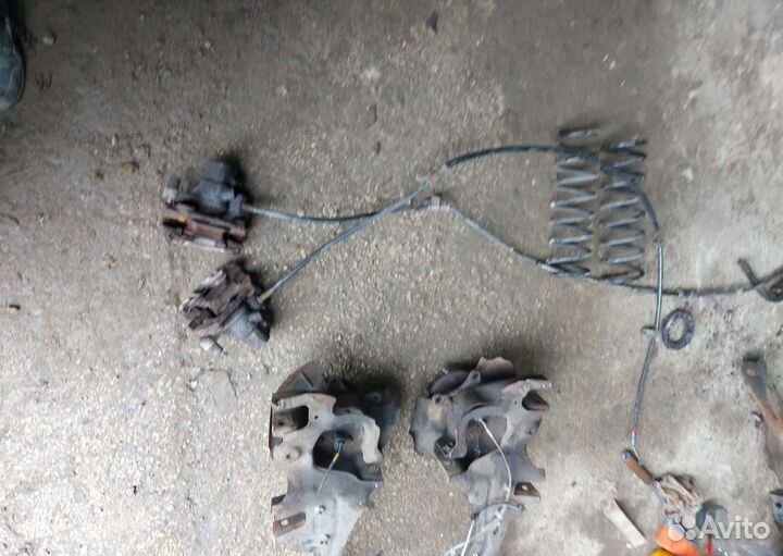 Суппорт задний Мазда 3 bl