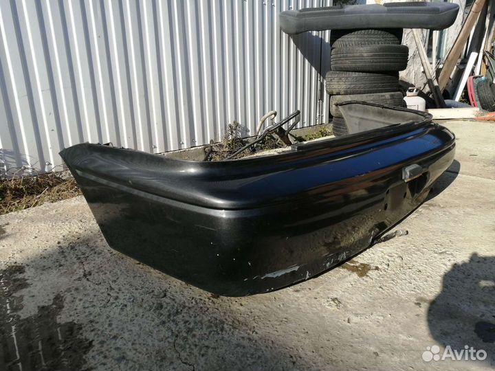 Бампер задний Mitsubishi Lancer Cedia CS 2000-2004