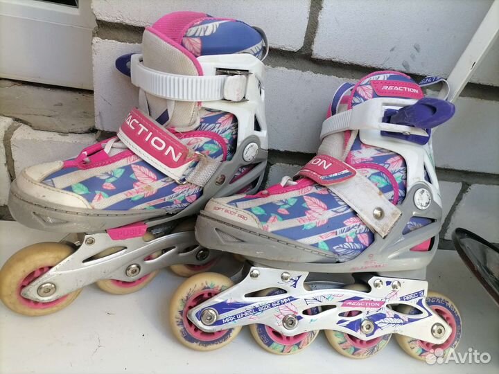 Роликовые коньки