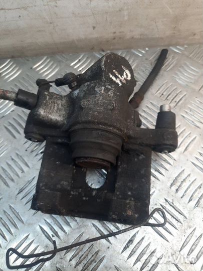 Суппорт тормозной задний правый Opel Vectra