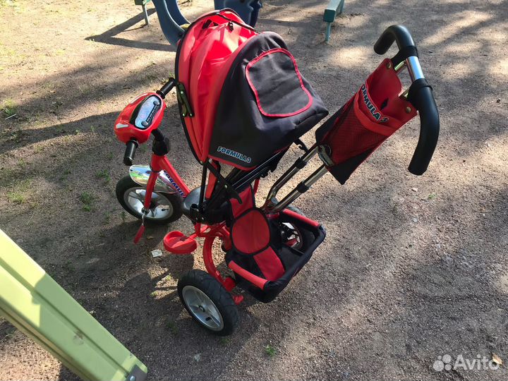 Трехколесный велосипед с ручкой