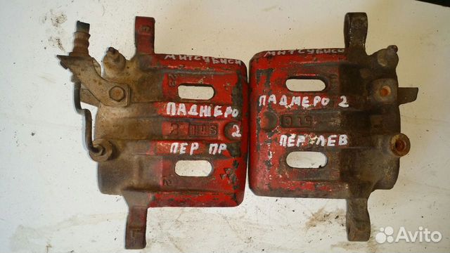 Суппорт передний правый левый Mitsubishi Pajero