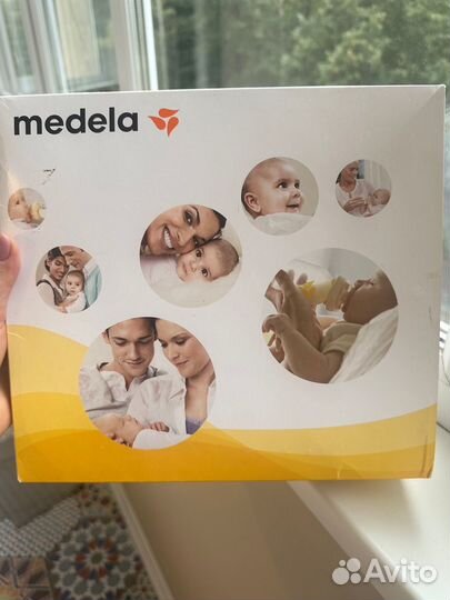 Молокоотсос электрический medela mini electrik