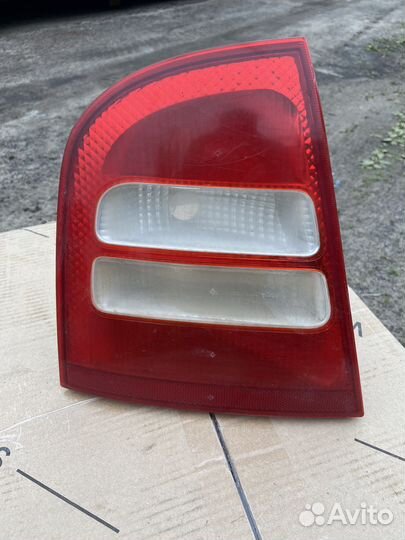 Фонарь левый Skoda Octavia A4 Tour
