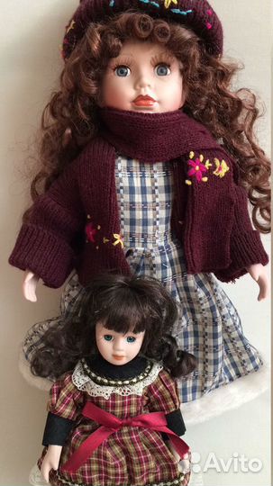 Две фарфоровые куклы