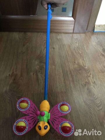 Игрушка каталка бабочка