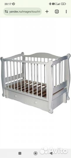 Детская кроватка с маятником и ящиком